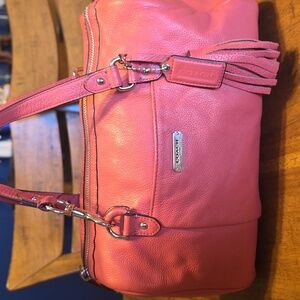 Coach Avery coral pebbled leather tassel satchel purse with style number F26121.